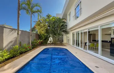 Casa em condomínio fechado com 5 quartos à venda na rua sabiú, 135, loteamento alphaville campinas, campinas, 424 m2 por r$ 4.240.000