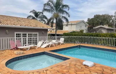 Casa em condomínio fechado com 3 quartos para alugar na rua da lagoa, 541, loteamento caminhos de san conrado (sousas), campinas, 134 m2 por r$ 4.500