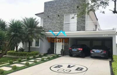 Casa de alto padrão em condomínio alphaville, santana de parnaíba-sp! 4 suítes, 4 vagas de garagem, 325m² de área. venha conferir!
