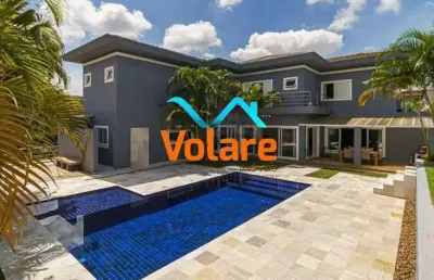 Casa de luxo no condomínio alphaville burke marx, santana de parnaíba-sp: 5 suítes, 10 vagas, 618m².
