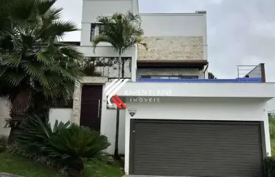 Casa alto padrão semimobiliada à venda com 3 suítes na pedra branca