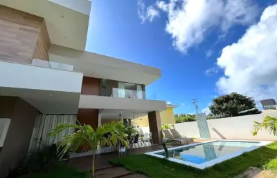 Luxuosa casa em condomínio à venda em guarajuba, camaçari-ba: 5 quartos, 5 suítes, 1 sala, 6 banheiros, 4 vagas de garagem, 250m².
