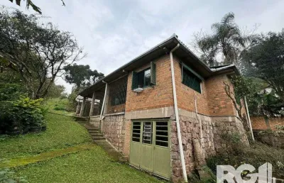 Casa com 3 quartos à venda na Rua dos Canudos, 358, Cascata, Porto Alegre