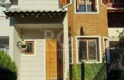 Casa com 3 quartos à venda na Rua Jayme Saul de Borba, 10*, Espírito Santo, Porto Alegre