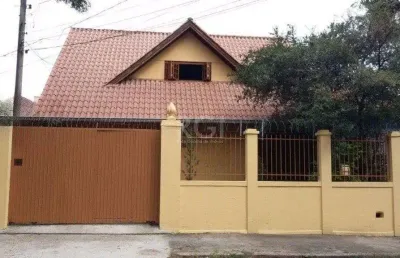 Casa com 3 quartos à venda na Rua Afonso Rodrigues, 263, Jardim Botânico, Porto Alegre