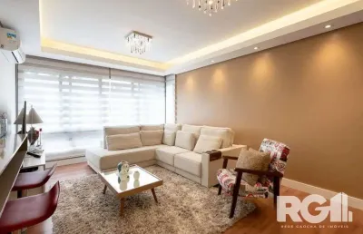 Apartamento de 3 dormitórios com suíte e churrasqueira, lavabo e 2 vagas de garagem.