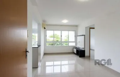 Apartamento semi-mobiliado, com área privada de 50,95 m2