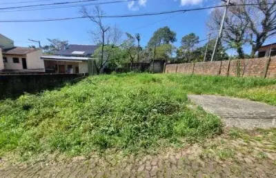 Terreno em condominio em porto alegre, no bairro vila nova, à venda.