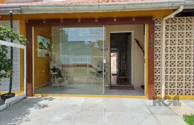 Casa em condomínio fechado com 2 quartos à venda na Rua Beija Flor, 771, Capão Novo, Capão da Canoa