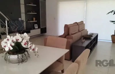 Casa em condomínio fechado com 3 quartos à venda na Avenida Jaçanã, 1000, Atlântida, Xangri-Lá