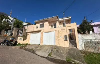 Casa com 4 dormitórios, suíte, churrasqueira, piscina e 2 vagas cobertas para locação