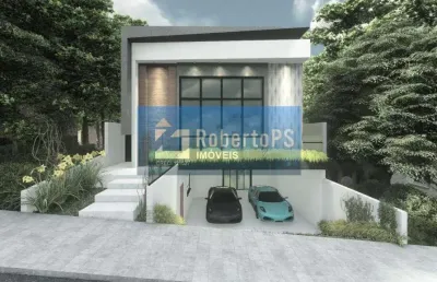 Linda casa em construção de dois pavimentos em condomínio fechado de 3 dormitórios.