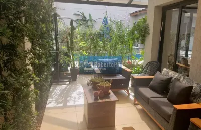 Sobrado com 4 quartos / 2 suítes com consultório em anexo e piscina