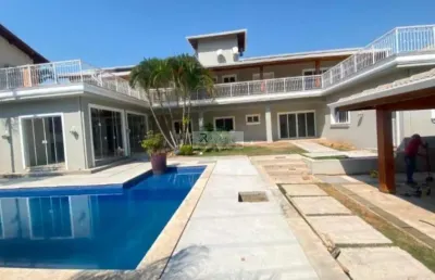Luxuosa mansão de 5 quartos e 5 suítes na vila suíça, indaiatuba-sp: 430m², 7 banheiros, sala ampla e 4 vagas de garagem.