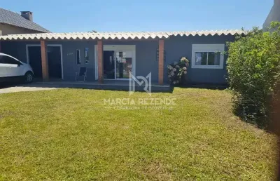Casa com piscina ao lado do lago braço morto de imbé!
