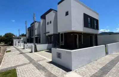 Residencial ouro verde - casa geminada com 2 dormitórios sendo 1 suíte e garagem - ca1209