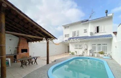 Casa com 4 quartos à venda na rua das bromélias, 184, loteamento bela vista, canoas por r$ 1.360.000