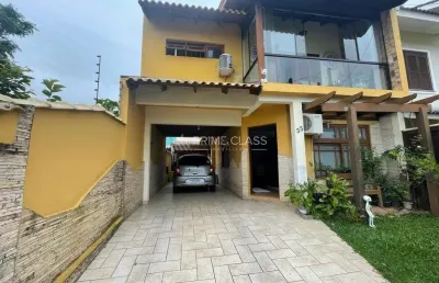 Casa com 3 quartos à venda na rua nevada, 33, mato grande, canoas por r$ 640.000