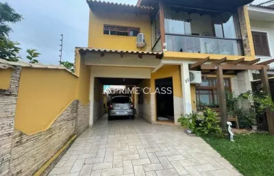 Casa com 3 quartos à venda na rua nevada, 33, mato grande, canoas por r$ 640.000