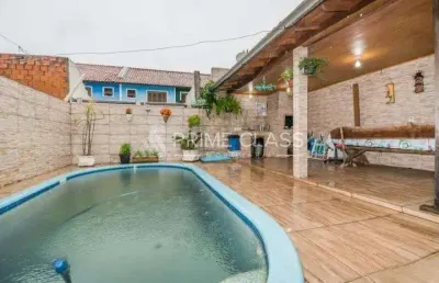 Casa com 4 quartos à venda na rua das andorinhas, 173, igara, canoas por r$ 636.000