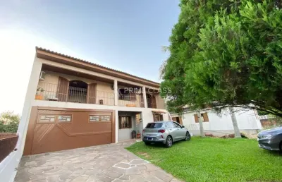 Casa com 4 quartos à venda na avenida do nazario, 513, olaria, canoas por r$ 998.000