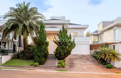 Casa em condomínio fechado com 3 quartos à venda na avenida açucena, 50, loteamento bela vista, canoas por r$ 3.100.000