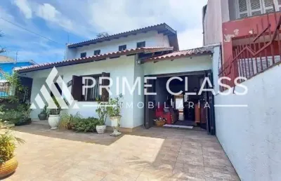 Casa com 3 quartos à venda na rua lynx, 216, moinhos de vento, canoas por r$ 690.000