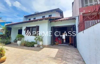 Casa com 3 quartos à venda na rua lynx, 216, moinhos de vento, canoas por r$ 690.000