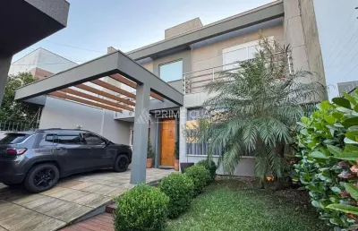Casa com 3 quartos à venda na rua henrique kranen filho, 26, mont serrat, canoas por r$ 1.369.900