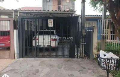 Casa em condomínio fechado com 3 quartos à venda na rua waldemar silva de souza, 85, são josé, canoas por r$ 371.000