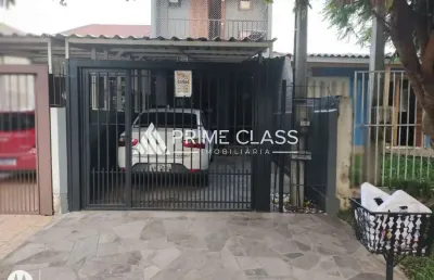 Casa em condomínio fechado com 3 quartos à venda na rua waldemar silva de souza, 85, são josé, canoas por r$ 371.000