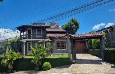 Casa com 3 quartos à venda na borges de medeiros, 61, nossa senhora das graças, canoas por r$ 1.250.000