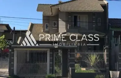 Casa com 3 quartos à venda na avenida doutor severo da silva, 1173, loteamento bela vista, canoas por r$ 1.325.000