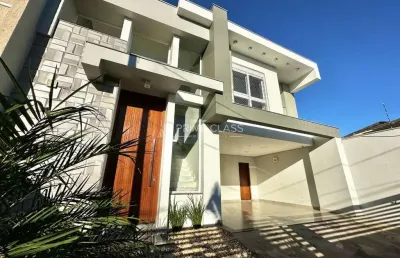 Casa com 3 quartos à venda na rua doutor joão césar, 31, mont serrat, canoas por r$ 1.680.000
