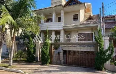 Casa com 4 quartos para alugar na rua das bromélias, 240, loteamento bela vista, canoas por r$ 12.500