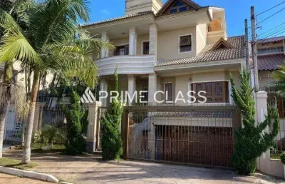 Casa com 4 quartos para alugar na rua das bromélias, 240, loteamento bela vista, canoas por r$ 12.500