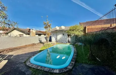 Casa com 3 quartos à venda na rua porto seguro, 382, nossa senhora das graças, canoas por r$ 477.000