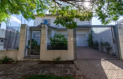 Casa com 4 quartos à venda na rua das bromélias, 184, moinhos de vento, canoas por r$ 1.290.000