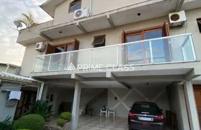 Casa com 5 quartos à venda na rua das camélias, 571, igara, canoas por r$ 1.280.000