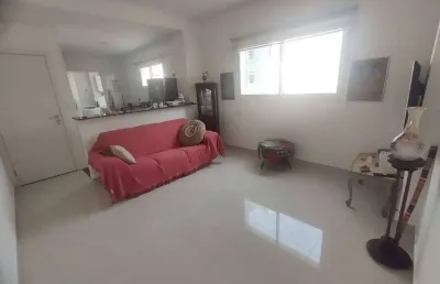 Apartamento 2 dormitórios em prédio frente ao mar com vista lateral garagem