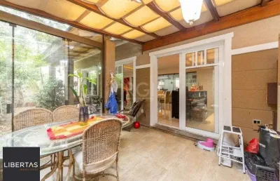 Casa em condomínio fechado com 4 quartos para alugar na Rua Attílio Bilibio, 120, Jardim Carvalho, Porto Alegre