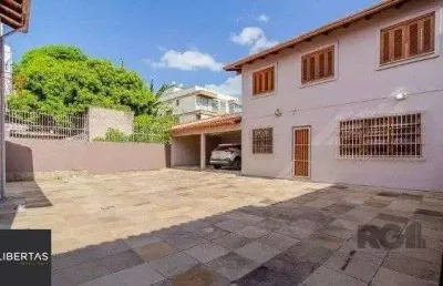 Casa com 4 quartos à venda na Rua Fonseca Ramos, 127, Medianeira, Porto Alegre