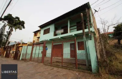 Casa com 3 quartos à venda na Rua Guadalajara, 115, Jardim Itu Sabará, Porto Alegre