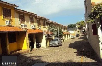 Casa em condomínio no partenon de 3 dormitórios e vaga