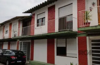Casa em condomínio fechado com 3 quartos à venda na Rua Jataí, 267, Cristal, Porto Alegre