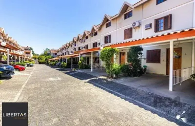 Casa em condominio no bairro tristeza de 3 dormitórios e vaga