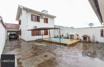 Casa com 4 quartos à venda na Rua Doutor Hermes Pacheco, 465, Aberta dos Morros, Porto Alegre