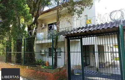 Casa com 3 quartos à venda na Rua Lauro Rodrigues, 590, Costa e Silva, Porto Alegre