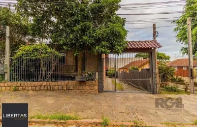 Casa com 4 quartos à venda na Rua Antônio Josephino Perrone, 243, Espírito Santo, Porto Alegre