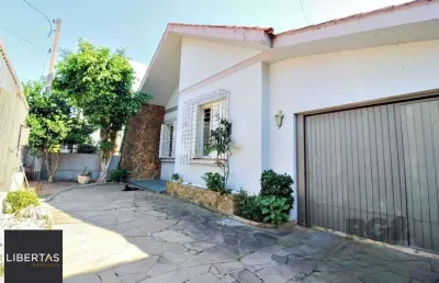 Casa 4 dormitórios, 2 vagas, em rua tranquila próxima a rua oscar pereira
